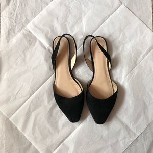 Sling-back pointed-toe flats.